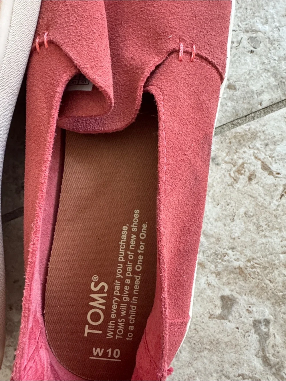 TOMS Women's Slip on sneaker style in Rust colored Red Suede
